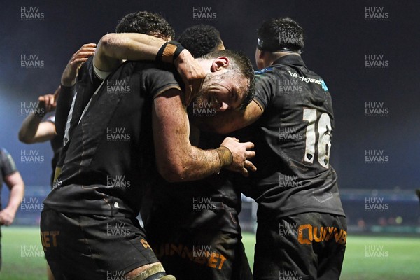 310126 - Ospreys v Dragons RFC - United Rugby Championship - Keelan Giles of Ospreys celebrates scoring a try with team mates