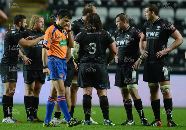 210913 - Ospreys v Edinburgh - RaboDirect PRO12 -Referee Marius Mitrea talks to TV match official Paul Adams