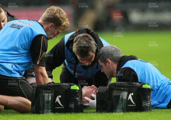 200913 Ospreys v Edinburgh - RaboDirectPro12 -Ospreys' Sam Lewis receives treatment