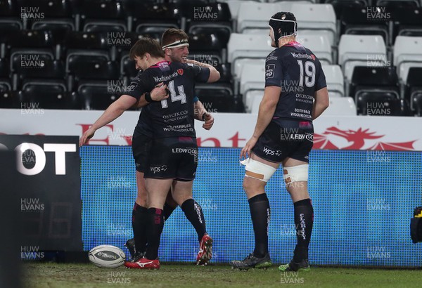 190216 - Ospreys v Edinburgh - Guinness PRO12 - Scott Otten of Ospreys celebrates scoring a try with team mates