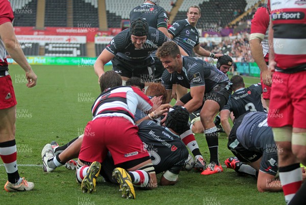 210914 - Ospreys v Edinburgh - Guinness PRO12 - Dan Baker of Ospreys is helped over the line to try their third try 