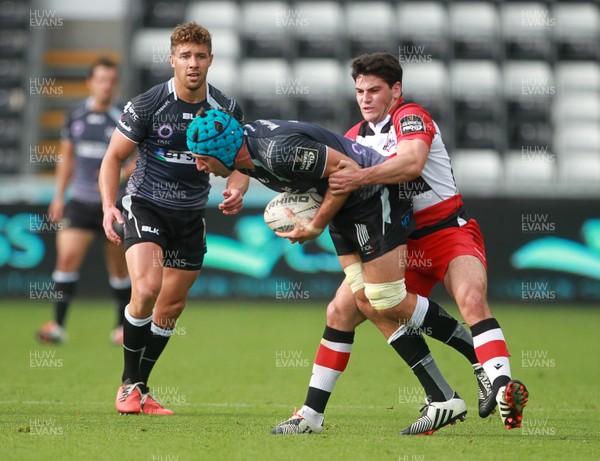 210914 - Ospreys v Edinburgh - Guinness PRO12 - Justin Tipuric of Ospreys is tackled by Sam Hidalgo-Clyne of Edinburgh  