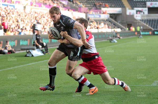 210914 - Ospreys v Edinburgh - Guinness PRO12 - Jonathan Spratt of Ospreys goes over the line to score a try 