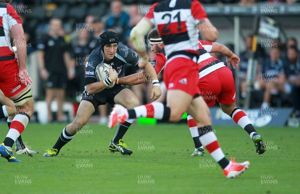 210914 - Ospreys v Edinburgh - Guinness PRO12 - Sam Davies of Ospreys is tackled by Ollie Atkins of Edinburgh 