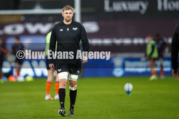 290122 - Ospreys v Edinburgh - United Rugby Championship - Will Griffiths of Ospreys warms up ahead of the match