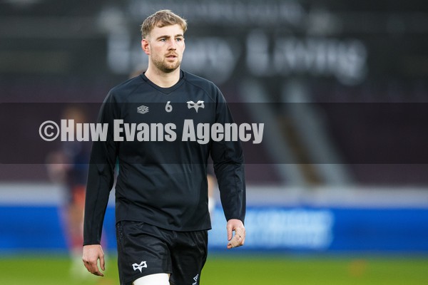 290122 - Ospreys v Edinburgh - United Rugby Championship - Will Griffiths of Ospreys warms up ahead of the match