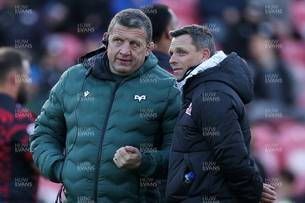 081224 - Ospreys v Emirates Lions, EPCR Challenge Cup - Ospreys Head Coach Toby Booth and Lions Head Coach Ivan Van Rooyen