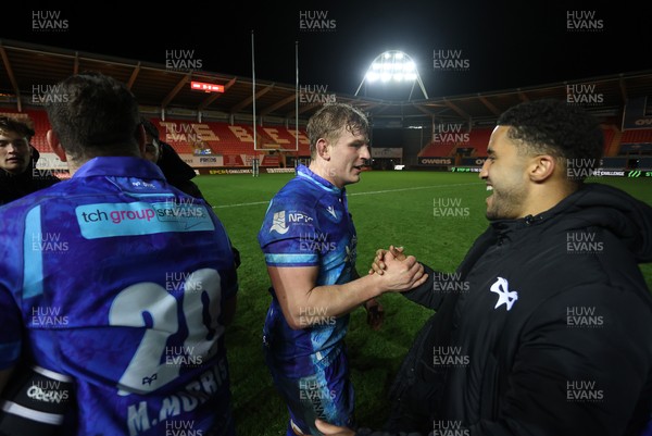 081224 - Ospreys v Emirates Lions, EPCR Challenge Cup - Jac Morgan and Keelan Giles of Ospreys at full time