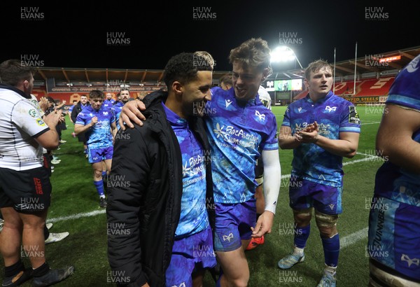 081224 - Ospreys v Emirates Lions, EPCR Challenge Cup - Keelan Giles and Jack Walsh of Ospreys at full time