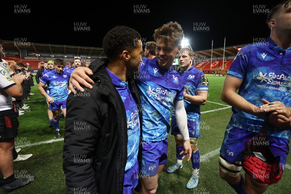 081224 - Ospreys v Emirates Lions, EPCR Challenge Cup - Keelan Giles and Jack Walsh of Ospreys at full time