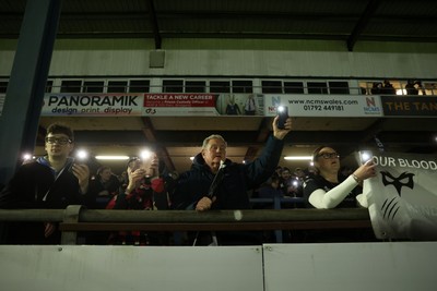 230126 - Ospreys v Emirates Lions - United Rugby Championship - Ospreys fans protest the potential changes to Welsh Rugby during the game on the 11th minute