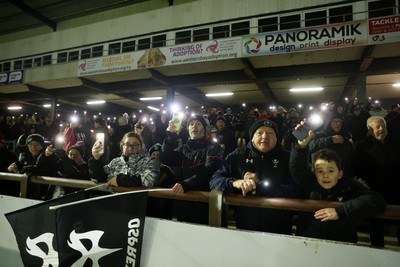 230126 - Ospreys v Emirates Lions - United Rugby Championship - Ospreys fans protest the potential changes to Welsh Rugby during the game on the 11th minute
