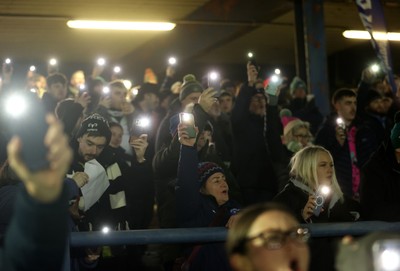 230126 - Ospreys v Emirates Lions - United Rugby Championship - Ospreys fans protest the potential changes to Welsh Rugby during the game on the 11th minute