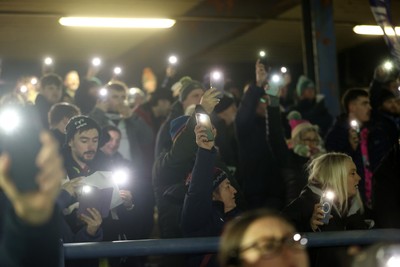 230126 - Ospreys v Emirates Lions - United Rugby Championship - Ospreys fans protest the potential changes to Welsh Rugby during the game on the 11th minute