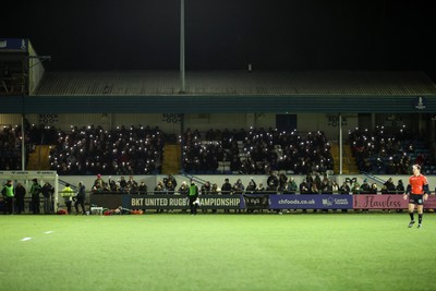 230126 - Ospreys v Emirates Lions - United Rugby Championship - Ospreys fans protest the potential changes to Welsh Rugby during the game on the 11th minute