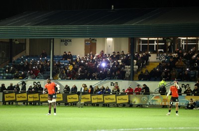 230126 - Ospreys v Emirates Lions - United Rugby Championship - Ospreys fans protest the potential changes to Welsh Rugby during the game on the 11th minute