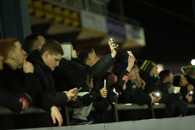 230126 - Ospreys v Emirates Lions - United Rugby Championship - Ospreys fans protest the potential changes to Welsh Rugby during the game on the 11th minute