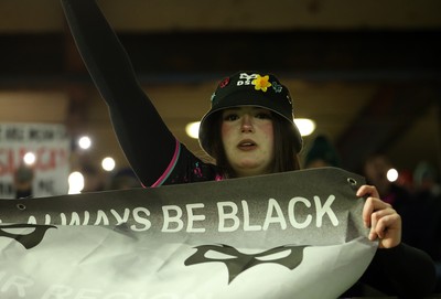 230126 - Ospreys v Emirates Lions - United Rugby Championship - Ospreys fans protest the potential changes to Welsh Rugby during the game on the 11th minute