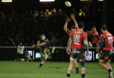 230126 - Ospreys v Emirates Lions - United Rugby Championship - Dan Edwards of Ospreys attempts a drop goal