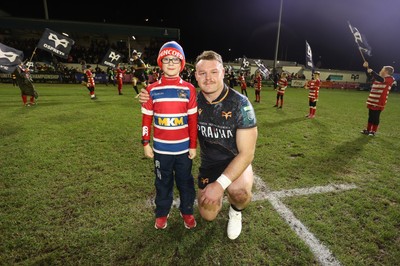 230126 - Ospreys v Emirates Lions - United Rugby Championship - Dewi Lake of Ospreys with mascot