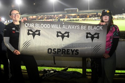 230126 - Ospreys v Emirates Lions - United Rugby Championship - Ospreys fans protest the potential changes to Welsh Rugby during the game