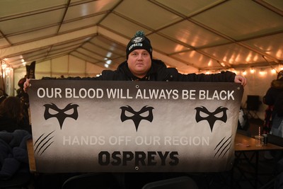 230126 - Ospreys v Emirates Lions - United Rugby Championship - Ospreys fans protest the potential changes to Welsh Rugby during the game