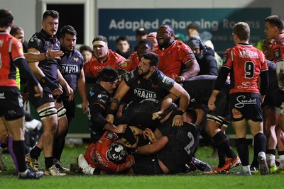 230126 - Ospreys v Emirates Lions - United Rugby Championship - Ospreys players push over for a try