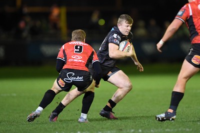 230126 - Ospreys v Emirates Lions - United Rugby Championship - Keiran Williams of Ospreys is challenged by Francke Horn of Lions