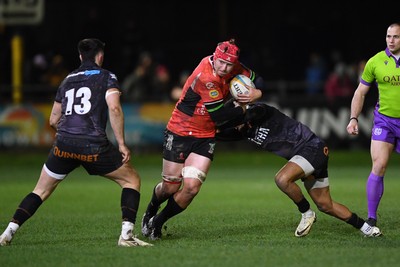 230126 - Ospreys v Emirates Lions - United Rugby Championship - Francke Horn of Lions is challenged by Dan Kasende of Ospreys