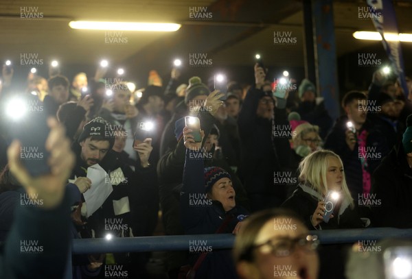230126 - Ospreys v Emirates Lions - United Rugby Championship - Ospreys fans protest the potential changes to Welsh Rugby during the game on the 11th minute
