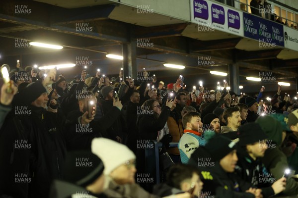 230126 - Ospreys v Emirates Lions - United Rugby Championship - Ospreys fans protest the potential changes to Welsh Rugby during the game on the 11th minute