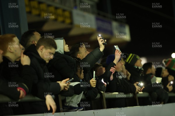 230126 - Ospreys v Emirates Lions - United Rugby Championship - Ospreys fans protest the potential changes to Welsh Rugby during the game on the 11th minute