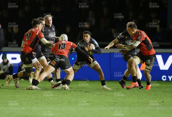 230126 - Ospreys v Emirates Lions - United Rugby Championship - Keelan Giles of Ospreys is challenged by Henco van Wyk of Lions 