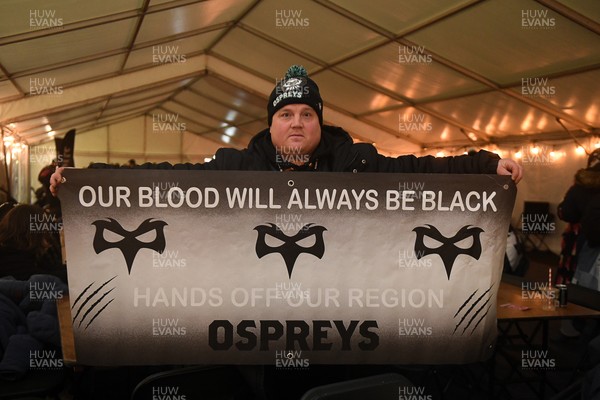 230126 - Ospreys v Emirates Lions - United Rugby Championship - Ospreys fans protest the potential changes to Welsh Rugby during the game