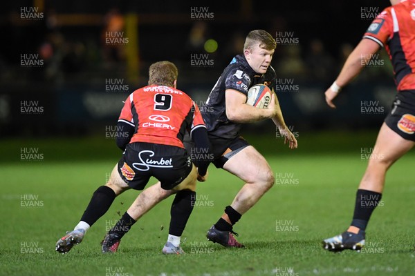 230126 - Ospreys v Emirates Lions - United Rugby Championship - Keiran Williams of Ospreys is challenged by Francke Horn of Lions