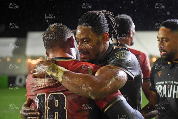 230126 - Ospreys v Emirates Lions - United Rugby Championship - Dan Kasende of Ospreys and Conrad Van Vuuren of Lions at full time