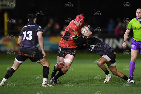 230126 - Ospreys v Emirates Lions - United Rugby Championship - Francke Horn of Lions is challenged by Dan Kasende of Ospreys