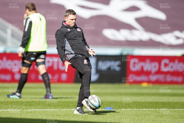 300324 - Ospreys v Emirates Lions - United Rugby Championship - Emirates Lions Head Coach Ivan van Rooyen during the warm up