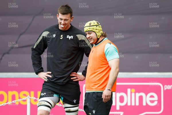 300324 - Ospreys v Emirates Lions - United Rugby Championship - Adam Beard and Harri Deaves of Ospreys during the warm up