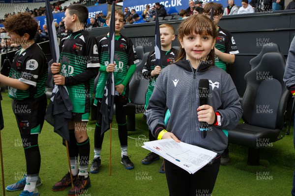 300324 - Ospreys v Emirates Lions - United Rugby Championship - Young girl announcing the Ospreys team