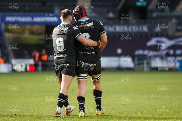 300324 - Ospreys v Emirates Lions - United Rugby Championship - Reuben Morgan-Williams congratulates Morgan Morris of Ospreys after scoring a try