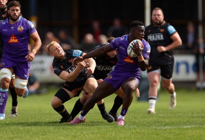 060925 - Ospreys v Exeter Chiefs - Pre Season Friendly - Paul Brown-Bampoe of Exeter is challenged by Iestyn Hopkins of Ospreys 