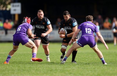 060925 - Ospreys v Exeter Chiefs - Pre Season Friendly - Rhys Davies of Ospreys is tackled by Nick Lilley of Exeter 