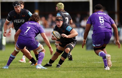 060925 - Ospreys v Exeter Chiefs - Pre Season Friendly - Morgan Morse of Ospreys is challenged by Ethan Roots of Exeter 
