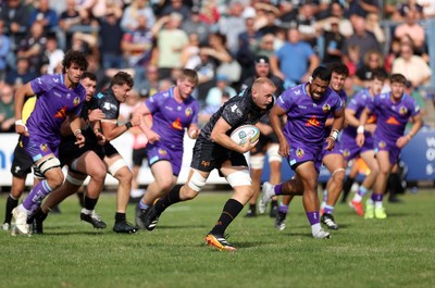 060925 - Ospreys v Exeter Chiefs - Pre Season Friendly - Huw Sutton of Ospreys makes a break