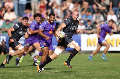 060925 - Ospreys v Exeter Chiefs - Pre Season Friendly - Huw Sutton of Ospreys makes a break