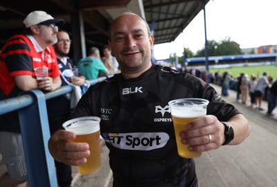060925 - Ospreys v Exeter Chiefs - Pre Season Friendly - Fan holding beer