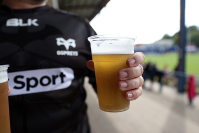 060925 - Ospreys v Exeter Chiefs - Pre Season Friendly - Fan holding beer