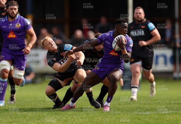 060925 - Ospreys v Exeter Chiefs - Pre Season Friendly - Paul Brown-Bampoe of Exeter is challenged by Iestyn Hopkins of Ospreys 
