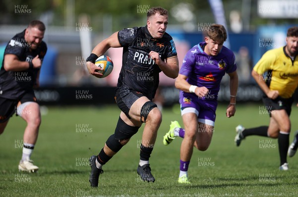 060925 - Ospreys v Exeter Chiefs - Pre Season Friendly - Morgan Morse of Ospreys makes a break